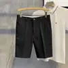 Novas Calças Curtas de Verão 2024 Estilo Coreano Tendência Versátil Slim Comprimento Médio Cor Sólida Sem Amassar Calças Casuais Masculinas