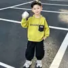 Conjunto de Sudadera para Niños Primavera y Otoño 2026 Nuevo Estilo Coreano Conjunto Deportivo de Dos Piezas para Niños Ropa para Niños Medianos y Mayores de Moda