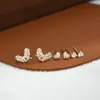 Aguja de plata S925 corazón de melocotón lazo una tarjeta tres pares de pendientes de botón para mujer diseño simple nuevo conjunto de tres piezas pendientes moda venta al por mayor