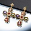 Pendientes de lujo de gran venta transfronteriza con circonitas chapadas en oro y personalidad exagerada. Pendientes largos cruzados para mujer.