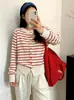 Camisa rayada adelgazante para mujer de talla grande, top de cuello redondo para mujer, estilo otoño 2026, suéter de punto holgado versátil para mujeres de talla grande