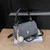 Bolso de mano casual elegante Shuai Mi Jia para mujer, nuevo modelo principios de otoño 2026, bolso cuadrado pequeño simple, bolso bandolera de moda