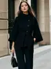 Ropa de mujer transfronteriza europea y americana 2026: cuello mao, cierre de botones diagonal, mangas acampanadas, cintura con cinturón y elegante abrigo de lana para ir al trabajo