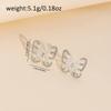 Aretes de Mariposa al por Mayor Joyería Transfronteriza Europea y Americana Moda Femenina con Incrustaciones de Diamantes Versátiles de Personalidad Pendientes de Aleación Nicho Sensación de Alta Gama