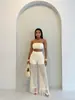 TK Verano Nueva Llegada Moda Femenina Europea Americana Sexy Transparente Hueco Borla Pantalones Largos Conjunto de Punto Bandeau