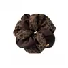 Elástico de Cabelo Scrunchie de Alta Qualidade Estilo Coreano Estampa de Leopardo Duas Cores para Mulheres, Novo Modelo 2026 Corda de Cabelo para Rabo de Cavalo com um Toque de Sofisticação