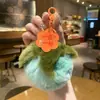 Nuevo Suceden Cosas Buenas Colgante Llavero de Felpa Hoja de Caqui Muñeca Conmemorativa Cultural y Creativa Decoración de Bolsa de Regalo para Niños