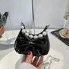 2026 Lazo Elegante Gran Capacidad Moderno Nuevo de Moda Cadena Chica Popular Bolso de Axila Perla Bolso de Hombro