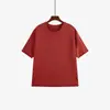 Camiseta casual de manga curta com barra dobrada e gola redonda para mulheres plus size, estilo outono 2026, top de malha solto versátil para mulheres plus size 25052