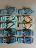 Zapatillas de liquidación de inventario de goma y plástico para mujer, zapatillas ligeras de playa para interior para hombre, sandalias de sensación caída para pareja, inventario