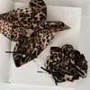 Lazo para el pelo de falda con estampado de leopardo grande estilo perezoso, Cuerda para el pelo de coleta baja moderna y elegante, Accesorios para el pelo de alta gama