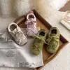 Zapatillas de entrenamiento alemanas para niños 2026 primavera y otoño nueva versión coreana zapatillas retro con lazo para niñas suela blanda zapatos Forrest Gump modernos