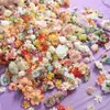 Por peso, stock sobrante de cabezas de flores simuladas, flores artificiales, pasadores para el cabello de bricolaje, materiales para coronas Hanfu, decoraciones de boda y tela de seda.