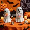 Nuevo producto transfronterizo: Adorno de fantasma lindo de Halloween, artesanía de resina, fantasma sosteniendo dulces, adorno de decoración para el hogar