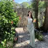 Vestido de Malla Elástica Color Verde Menta con Parches, Falso Dos Piezas, Corte Ajustado, Cuello Halter, Manga Larga, Longitud Media para Mujer en Tejido de Punto