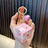 Woan coolomi llavero colgante cubo de Rubik al por mayor mini portátil cubo de Rubik colgante juguete educativo