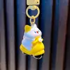 Llavero Colgante de Gatito Lindo, Colgante de Bola de Pelo de Gato Ciclista, Decoración de Mochila Escolar, Pequeño Regalo al por Mayor