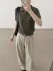 Cárdigan de punto con solapa de hilo puntiagudo, rayas verticales caladas, manga corta para mujer, nuevo estilo de top de otoño 26, camiseta holgada y versátil