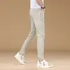 Tendencia de Moda 2026 Otoño Nuevos Jeans Elásticos Ajustados para Hombre Marca Trendy de Gama Alta Lavados Casuales Pantalones Largos