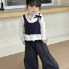Conjunto de Ropa para Niña Tongxingyuan 2026 Primavera Nuevo Estilo Coreano Moda Top Falso de Dos Piezas y Conjunto de Pantalones Largos para Niñas