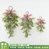 Decoración colgante de muérdago artificial flocado simulado más vendida transfronteriza, venta al por mayor desde la fábrica de origen, colgador de puerta de Navidad con lazo de frutos rojos