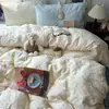 Conjunto de cama de algodão de quatro peças estilo Ins, campeão de vendas, categoria A para bebê e mãe, lençol para dormir sem nada e fronha, conjunto de três peças com saia de cama para dormitório