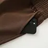 Pantalones mom rectos nuevos y elegantes de primavera y otoño para mujeres de 50 a 60 años, de corte holgado, sencillos y versátiles