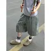 Pantalones cortos de cuadros azules y verdes para hombre y mujer, verano 2026, retro americano casual, corte holgado, versátiles.