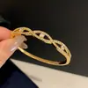 Elegante e Intricado: Pulsera circular de zircón tejida, de doble capa, estilo vintage francés, joyería de nicho al por mayor