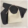 2025 Nova Bolsa de Ombro Transfronteiriça Feminina Moda Vintage Nicho Bolsa Tote Grande Capacidade Padrão Trançado Bolsa de Ombro para o Dia a Dia