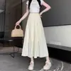 Falda de pastel blanca, falda de paraguas para mujer, nuevo estilo de verano, fluida, falda plisada que cubre la cadera, falda larga de línea A, falda de longitud media para petite