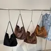 Colección de otoño 2026 transfronteriza: Bolso de hombro/bandolera de gamuza de gran capacidad, casual y a la moda para mujer, adecuado para ir al trabajo