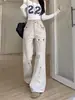 Calça jeans de trabalho estilo americano com barra flare para mulheres, tamanho petite, design de cintura alta, fecho de zíper, caimento solto, efeito emagrecedor, calça casual de perna larga