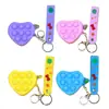 Bolsa de Monedas de Silicona de Dibujos Animados Creativos Bolsa para Auriculares Colgante para Llavero Venta al por Mayor Mini Bolsa Colgante para Llavero