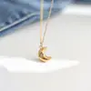 Moda Europea y Americana Personalidad Accesorios Versátiles Estrella de Ocho Puntas Encrustada de Diamantes Luna Cadena de Clavícula de Acero de Titanio para Mujeres Nicho Lujo Ligero Cadena de Clavícula
