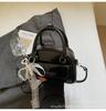 Bolsa de concha de diseño de nicho para chica linda, temporada Primavera/Verano 2026, bolso Boston de alta gama, bolso de hombro cruzado para mujer