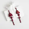 Pendientes Amazon transfronterizos, extragrandes, electrochapados, elegantes, de estilo largo, con un toque de alta gama, adornados con borlas y pedrería negra