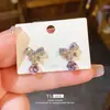 Brincos de Agulha de Prata Luxo Leve Flor de Trevo de Quatro Folhas Pétala Laço de Diamante Personalidade Nicho Elegante High-end para Mulheres