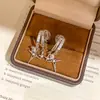 Pendientes de Clip de Estrella de Zirconia Chapados en Oro de 18 Quilates Starburst Diamond para Mujer, Pendientes sin Perforar, Pendientes de Lujo Ligero de Gama Alta para Mujer