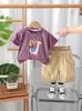 2025 Nuevo Verano Niños Cuello Redondo Estampado de Caricaturas con Letras Manga Corta Traje de Shorts Casual Fabricante Mayorista