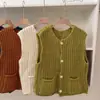 Chaleco de punto grueso versátil estilo retro coreano de principios de otoño, chaqueta de punto sin mangas de un solo pecho para mujer