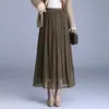 Falda midi plisada taiwanesa con una textura distintiva, nuevo estilo otoño/invierno 2026, con efecto de caída, elegancia veraniega, longitud media