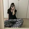 Pantalones Largos de Pierna Ancha Estilo Vacaciones Relajado Minimalista Estampado Floral Vintage Blanco y Negro de la Abuela para Mujer Verano 2026