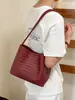 Bolsa transfronteiriça de alta qualidade com padrão trançado para mulheres, novo design de nicho da moda 2026, bolsa de ombro e de ombro versátil e elegante