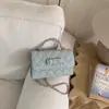 Bolso de Alta Gama para Mujer 2026 Nuevo Lujo de Nicho Bolso Cuadrado Pequeño con Lazo y Cadena Texturizada Bolso de Hombro Cruzado