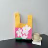 Bolsa Tricotada com Senso Avançado Nova Bolsa de Pulso de Desenho Animado Bolsa de Férias Bolsa de Mão Nicho Versátil Bolsa de Mão Bolsa de Presente