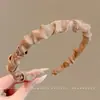 Diadema de lujo ligero sintiendo presión ambiente para el cabello diadema cara femenina accesorio para el cabello de lazo estilo retro Hong Kong pinza para el cabello tocado de alta gama