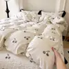 Juego de ropa de cama de cuatro piezas de algodón francés puro lavado con agua de grado A funda de edredón de gasa de doble capa sábana sábana bajera juego de tres piezas estilo estudiante 4