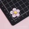 Accesorios de resina de flor redonda de cinco pétalos de color transparente como el hielo pegamento cremoso llavero DIY funda de teléfono hecha a mano accesorios para el cabello venta al por mayor