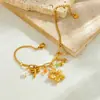 Nuevo y Moderno Estilo Pastoral Multielemento Flor de Cerezo Chapada en Oro Libélula Colgante Cadena de Perlas Pulsera de Acero Inoxidable para Mujeres